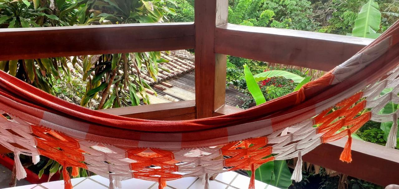 Novos Baianos Hostel E Pousada ปอร์โตเซกูโร ภายนอก รูปภาพ A hammock