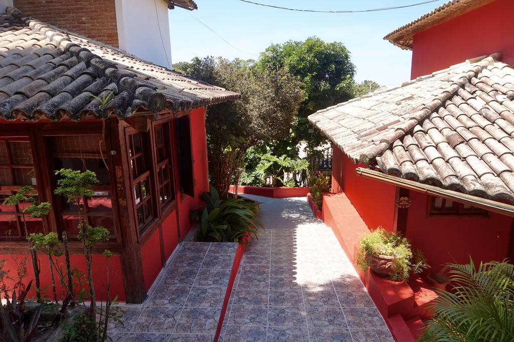 Novos Baianos Hostel E Pousada ปอร์โตเซกูโร ภายนอก รูปภาพ A street in the village